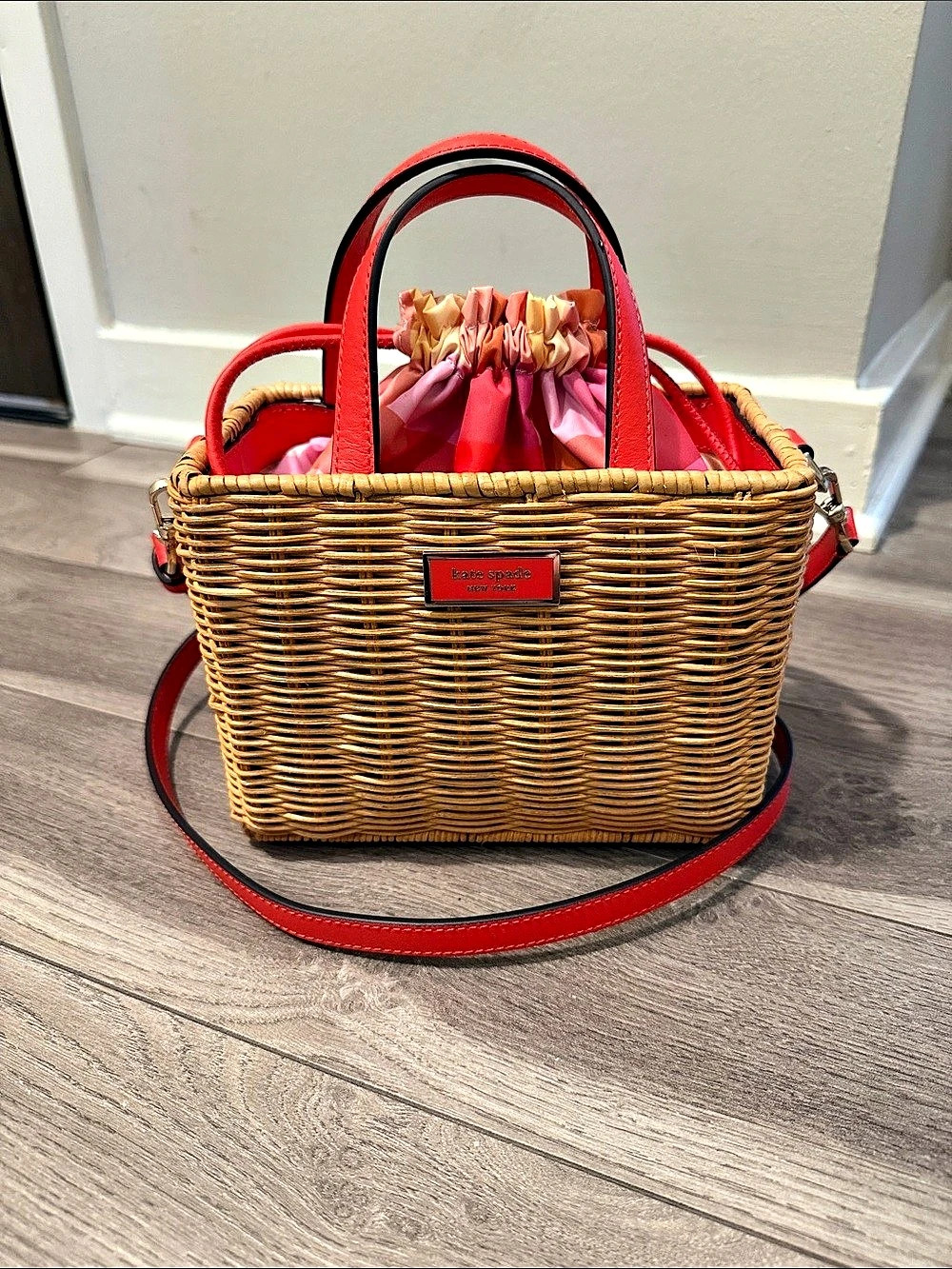 Kate Spade - woven basket purse with pink/yellow/coral liner